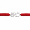 A red braided cord bracelet with a silver-tone central charm spelling 'BRO' in a stylized font, embellished with small clear stones on the letter B.