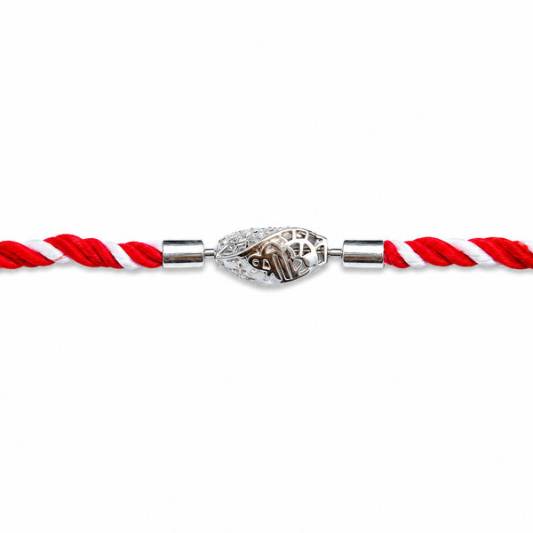 A red and white twisted cord bracelet with a central silver-toned decorative bead featuring the word 'SHREE' engraved on it, shown against a plain white background.